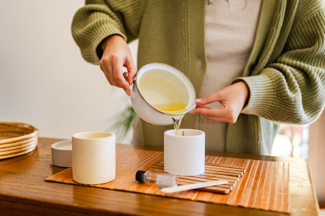 pouring soy wax to make candles