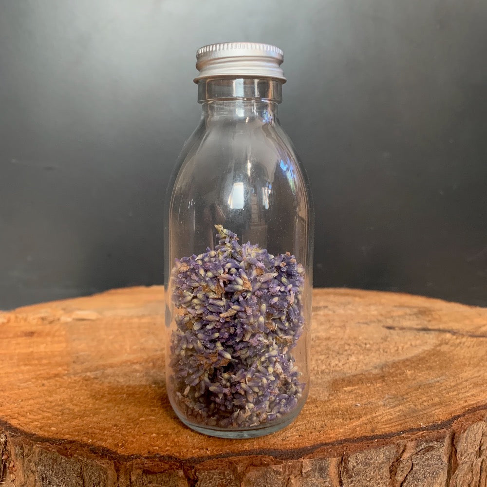 dried lavender in a glass bottle